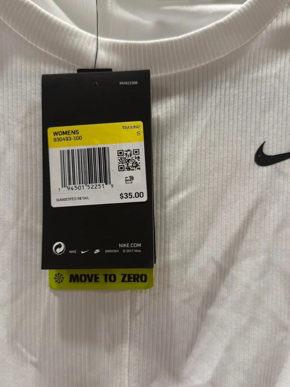 White Nike cinched tank top with black swoosh